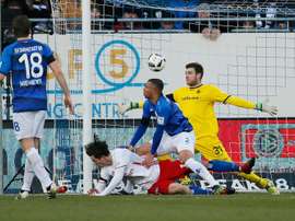 Hamburgs (2nd L) Michael Gregoritsch scores during the match between Darmstadt 98 and Hamburg. AFP