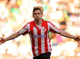 Athletic Bilbaos forward Iker Muniain celebrates after scoring during the Spanish league football match against Real Betis Balompie at the Benito Villamarin stadium in Sevilla on February 23, 2014