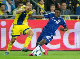 Maccabi Tel Aviv forward Tal Ben Haim II is tackled by Chelseas Abdul Baba Rahman. AFP