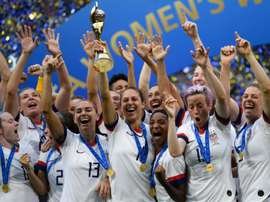 Victorious US women's team back on home soil