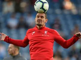 Lovren is being linked with a move to Serie A. AFP