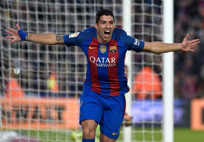Barcelonas forward Luis Suarez celebrates a goal during the Spanish league football match against Real Madrid CF December 3, 2016