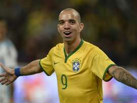 Tardelli has been banned for rubbing his face during the Chinese national anthem. AFP