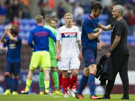 Keane is congratulated by Mourinho after United's pre-season victory over Wigan. ManchesterUnited