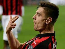 'See the light again': Piatek keeps AC Milan's Champions League bid on track.