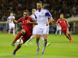 Spains forward Paco Alcacer (L) vies with Luxembourgs defender Maxime Chanot during the Euro 2016 qualifying football match at Las Gaunas stadium in Logrono on October 9, 2015