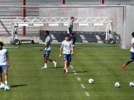 Bayern Munich resume training but hugs and challenges are banned. AFP