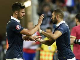 Há rivalidade entre Giroud e Benzema? AFP