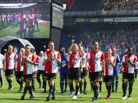 Feyenoord Rotterdams players walk on the pitch during the teams presentation to supporters on an Open Day at Feyenoord stadium in Rotterdam July 19, 2015