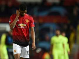 Paul Ince criticised United's performance against Barcelona. AFP