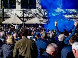 Three season ticket holders were banned for the ilegal action. AFP