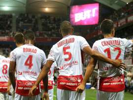 Reims celebrate after Chavarria scores the only goal of the game. AFP