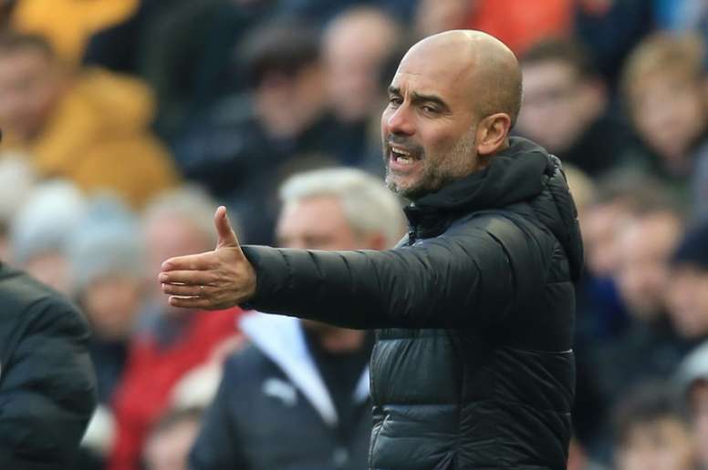Guardiola is pleased with his players' body language despite poor results recently for Man City. AFP