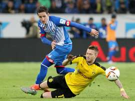 Hoffenheims midfielder Sebastian Rudy (L) and Dortmunds striker Marco Reus vie for the ball during the German first division Bundesliga football match TSG 1899 Hoffenheim vs Borussia Dortmund in Sinsheim, on September 23, 2015