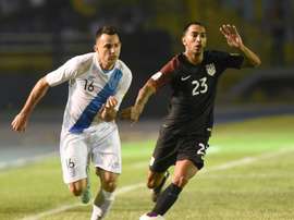 Guatamalas Marco Papa (L) and USAs Edgar Castillo during their World Cup qualifying match in Guatemala City on March 25, 2016
