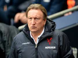 Neil Warnock denies receiving payments to select players. AFP