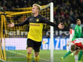 Dortmund hold off Slavia to reach Champions League last 16. AFP
