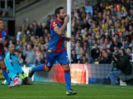 Crystal Palaceâs French midfielder Yohan Cabaye celebrates after scoring the opening goal from the penalty spot during the English Premier League football match in Watford, north of London on September 27, 2015