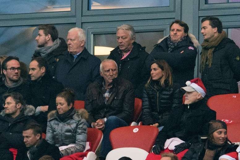 Red Bulls Austrian founder Dietrich Mateschitz (C) attends the German first division Bundesliga football match between RB Leipzig and Hertha BSC Berlin in Leipzig, eastern Germany on December 17, 2016