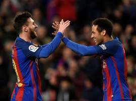 'Next year we have to do it': Neymar keen for Messi reunion. AFP