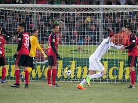 Bayern's Robert Lewandowski celebrates after scoring against SC Freiburg. AFP