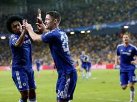 Chelseas defender Gary Cahill (R) celebrates with his Brazilian teammate Willian after scoring a goal during their UEFA champions league match between Maccabi Tel Aviv and Chelsea FC, in Haifa on November 24, 2015