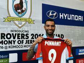 Former Arsenal and Liverpool winger Jermaine Pennant poses with his jersey after signing ceremony with the Tampines Rovers, in Singapore, on January 19, 2016