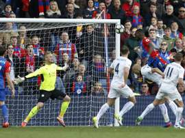 Benteke heads Palace closer to safety