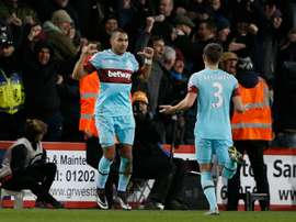 West Ham Uniteds midfielder Dimitri Payet (L) celebrates after scoring during the match between Bournemouth and West Ham United on January 12, 2016