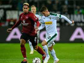 Dortmund are keen to nab a Bundesliga rivals' top man. AFP