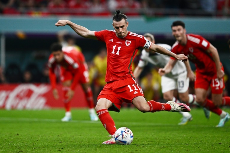 Bale makes history with Wales
