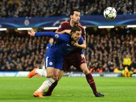 Gerrard elogia Busquets. AFP