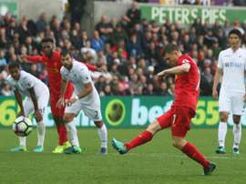 Los 'reds' remontaron un 1-0 en el Liberty Stadium. AFP