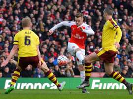 Arsenal defender Callum Chambers, 23, could be on his way to Craven Cottage. AFP