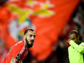 Benficas forward Kostas Mitroglou celebrates after scoring against SC Braga during the Portuguese Liga football match in Lisbon on April 1, 2016