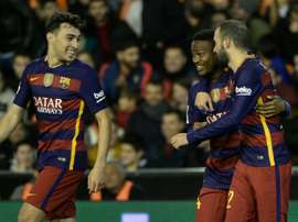 Barcelonas forward Wilfrid Kaptoum (C) celebrates his goal with Vidal Aleix and Munir El Haddadi (L) during Spanish Copa del Rey semifinal second leg match at the Mestalla stadium in Valencia on February 10, 2016