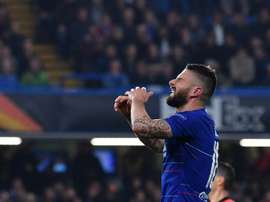 Another season at Stamford Bridge for Giroud. AFP