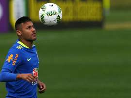 Brazilian footballer Neymar juggles with the ball during a training session ahead of the Rio Olympic Games, on July 19, 2016