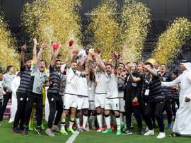 Al-Sadds players celebrate their victory in the Qatar Emir Cup