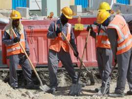 Workers at a construction site in Doha