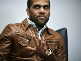 Alves neither confirmed nor denied rumours. AFP