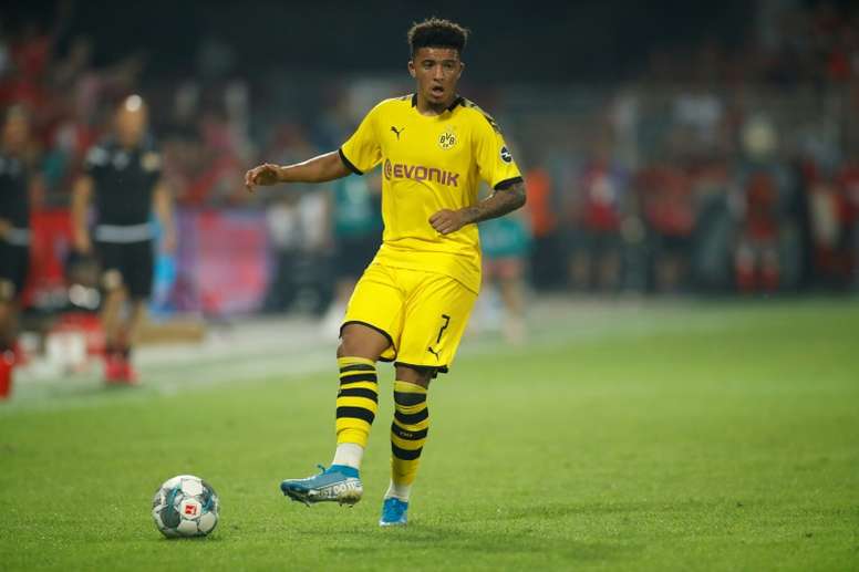 Sancho would help in improving United's attack. AFP