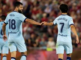 Felix (R) scored in Atletico Madrid's win on the island of Mallorca. AFP