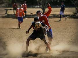 Youth team Titans of Jesus play football against another youth team at the Don Bosco Youth Centre in Managua