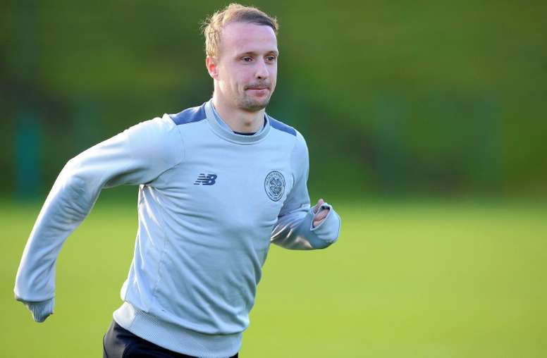 Celtics Leigh Griffiths (pictured) scored on the stroke of half-time before Callum McGregor saw red a minute after the interval for his second bookable offence
