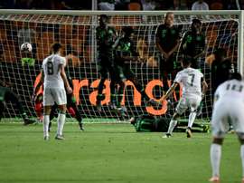 Mahrez's free-kick broke Nigerian hearts. AFP