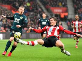 First Premier League club defers wages as union pleads for fairness. AFP