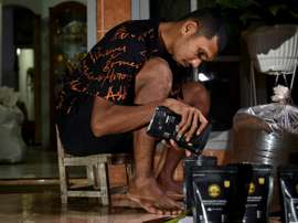Paying the penalty: coronavirus hits Indonesian footballers hard. AFP