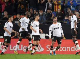 Atletico held at Valencia as Liverpool loom. AFP