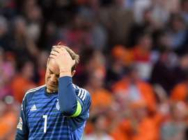 Neuer tenta recuperar o seu nível. AFP
